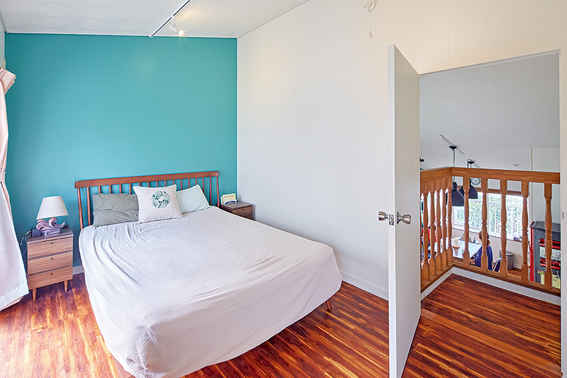 ３階寝室。壁はLDKと同じ色で塗装し、居住空間の統一感を出した